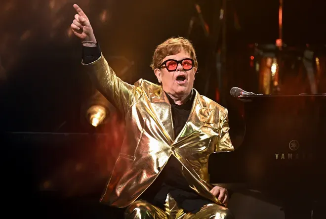 Elton John is feeling positive and "slowly recovering" after eye infection left him partially blinded